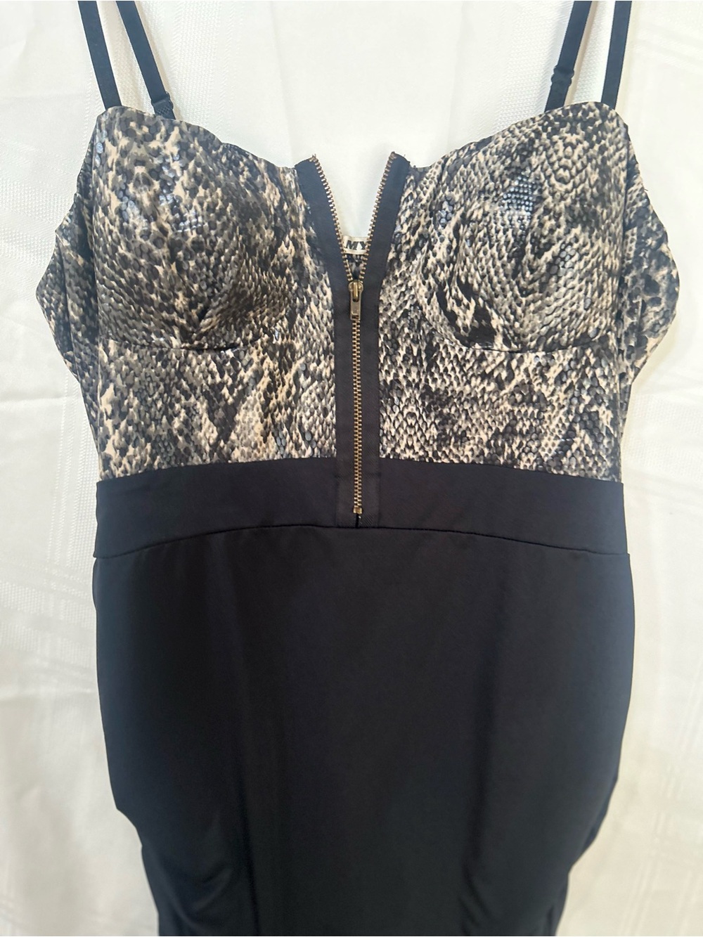 Plus size Mystic Black Dress with Snake-Print Bust, ruched sides, bodycon fit.